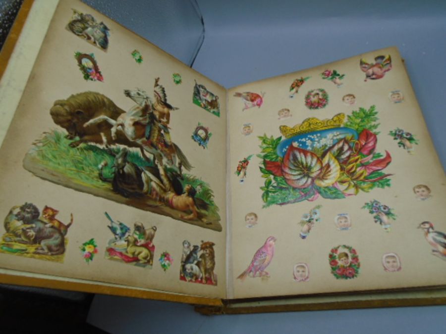 A Victorian scrap book full of cut out pictures - Image 3 of 7