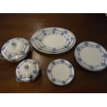 Newport pottery part dinner service, 3 platters, 4 dinner plates, 2 side plates, large tureen and