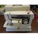 Singer 6136 electric sewing machine with manual and foot