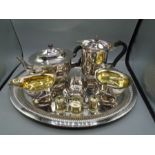 Plated table ware- tea and hot water pot, 2 sauce pots, cruet set, sugar bowl and tongs