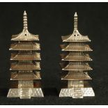 Pair of sterling silver pagoda form salt & peppers