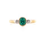 Created emerald, diamond and 9ct yellow gold ring