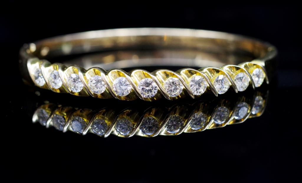 Diamond and yellow gold hinged bangle