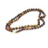 Vintage tigers eye opera length necklace and gold