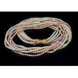 A good two colour pearl six strand necklace