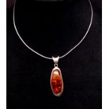 Cognac amber and silver pendnant and omega chain