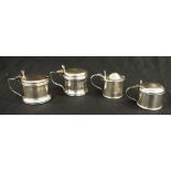 Four asst. George VI sterling silver mustard pots