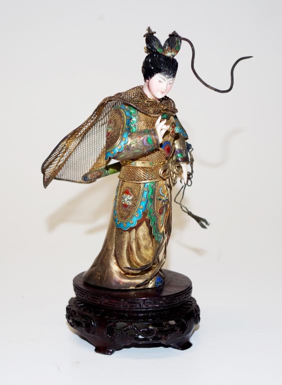 Japanese silver gilt, ivory, and enamel figurine