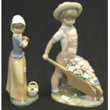 Lladro boy with wheelbarrow of flowers figurine