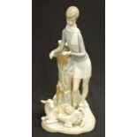 Lladro young boy reading a book with sheep figure