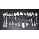 Twelve various silver souvenir coffee spoons