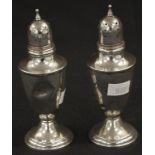 Pair of sterling silver salt & pepper shakers