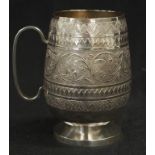 Large engraved Asian silver tankard