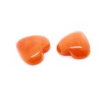 Pair of loose carved coral hearts