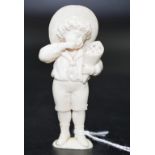 Early Ivory figure of a young boy