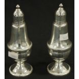 Pair of sterling silver salt & pepper shakers