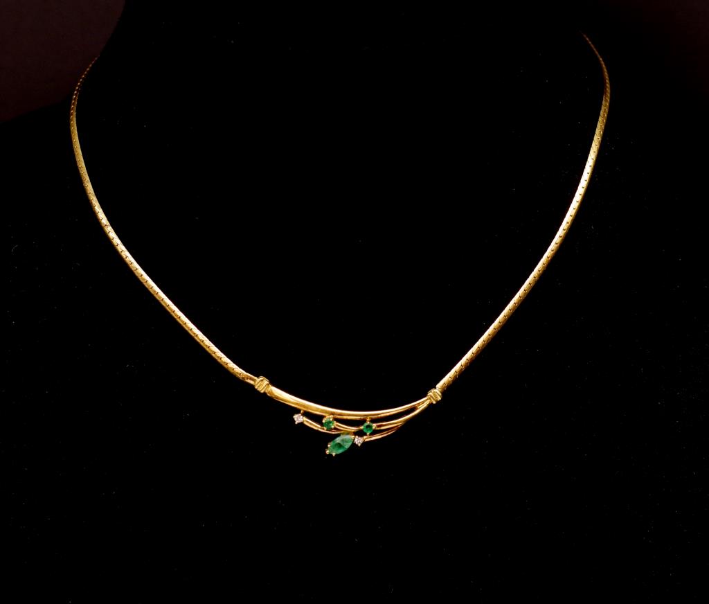 Emerald, diamond and 18ct yellow gold