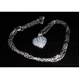 Topaz and 9ct white gold pendant and chain