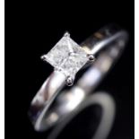 Princess cut diamond and 18ct white gold ring