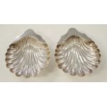 Two matching sterling silver shell dishes