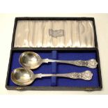 Cased pair George V sterling silver spoons