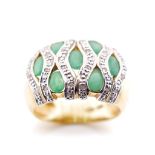 Emerald and diamond set two tone gold ring
