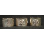 Three various sterling silver napkin rings