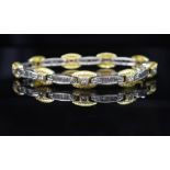 A good diamond and two tone gold bracelet