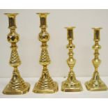 Two pair of 19th century brass candlesticks