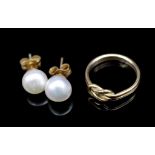 Yellow gold love knot ring and pearl earrings