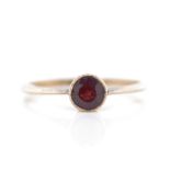 Early 20th C. garnet and 9ct yellow gold ring