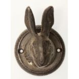Cast metal rabbit wall plaque