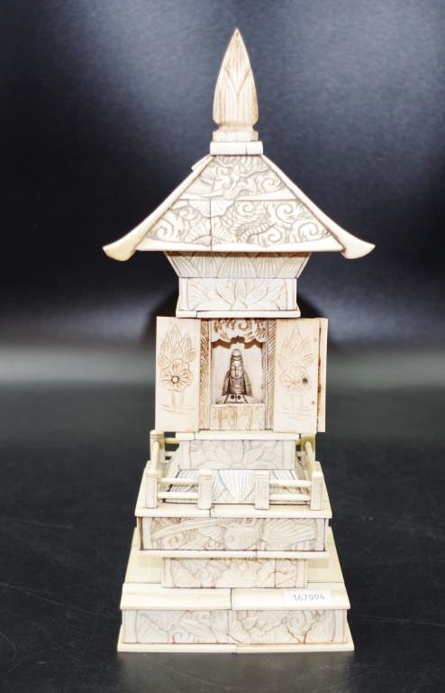 Oriental bone Buddhist shrine