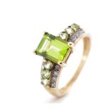 Peridot and diamond set 9ct yellow gold ring