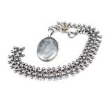 Late Victorian period silver locket and chain