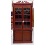 Antique mahogany elevated bookcase