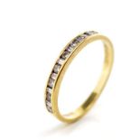 Channel set diamond and 18ct yellow gold ring