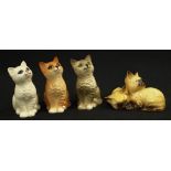 Four various ceramic Cat figures