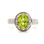 Peridot and diamond set 9ct yellow gold ring