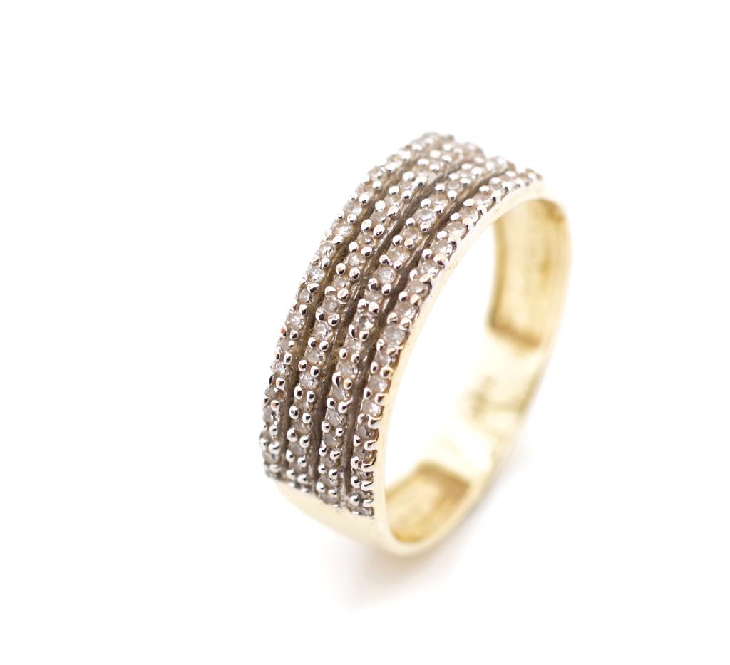 Four row diamond and yellow gold ring