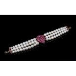 Ruby and pearl three strand bracelet