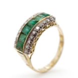Emerald and diamond set yellow gold ring