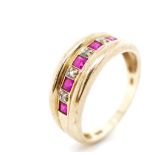 Created ruby, diamond and 9ct yellow gold ring
