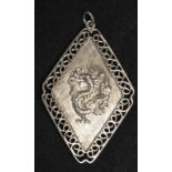 Chinese silver gilt dragon pendant