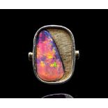 Black opal and 14ct yellow gold ring