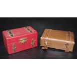 Two various lidded leather covered boxes
