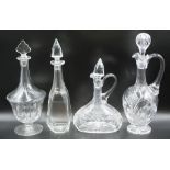 Four various crystal spirit decanters