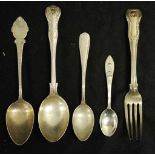 Four silver spoons and a fork