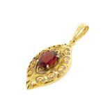 Garnet and yellow gold pendant