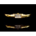 Rondine 18ct yellow gold bangle watch